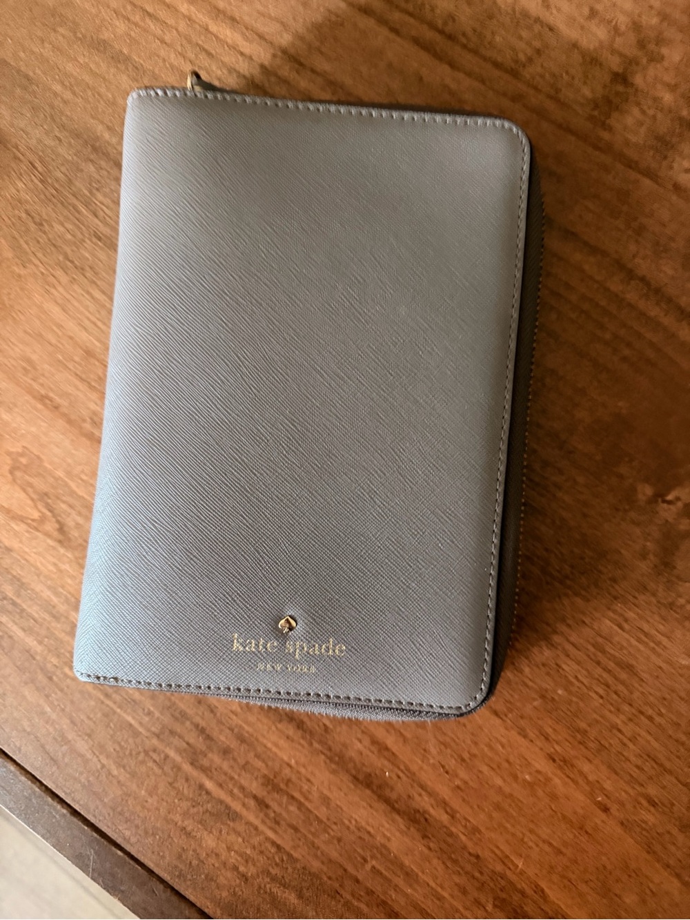 kate spade gray saffiano zip folio with gold logo